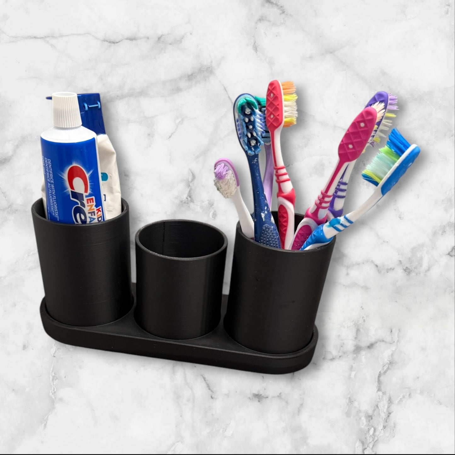 Toothbrush holder with cups