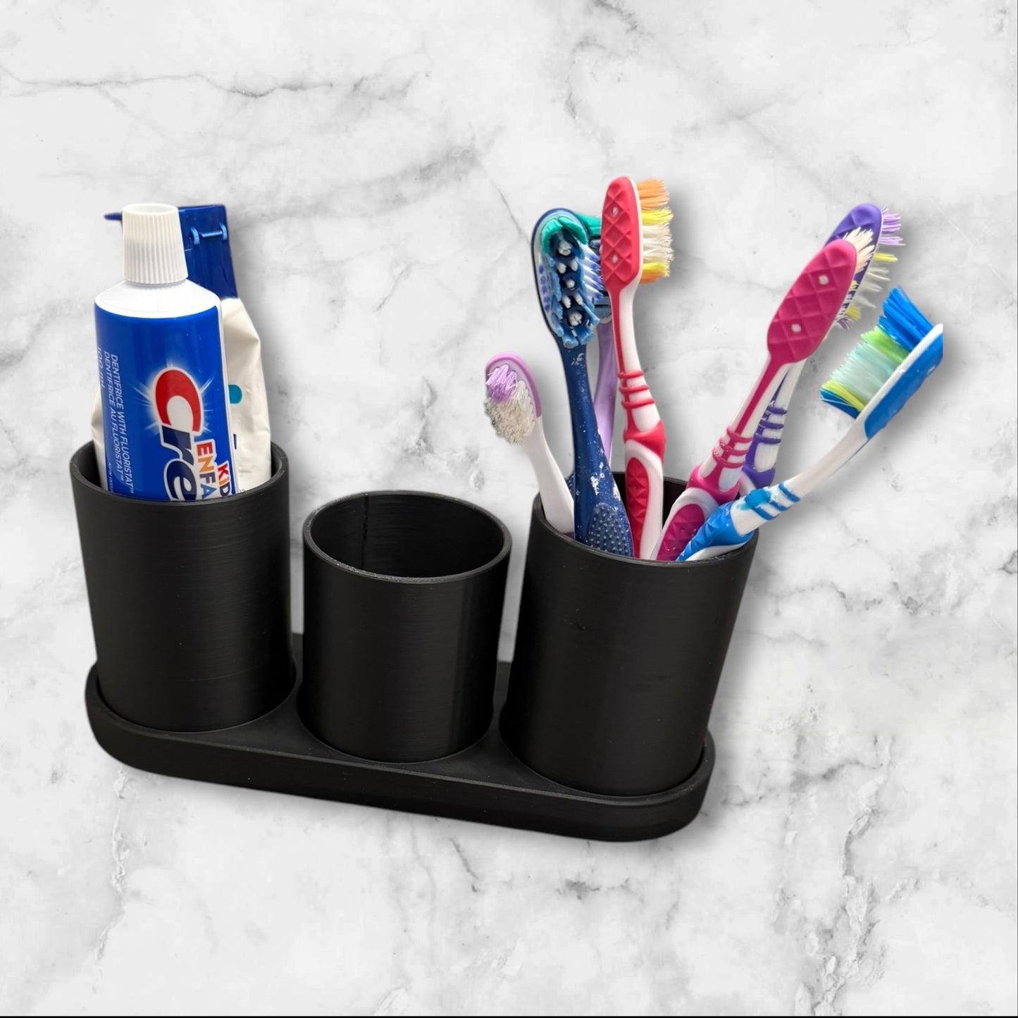 Toothbrush holder with cups