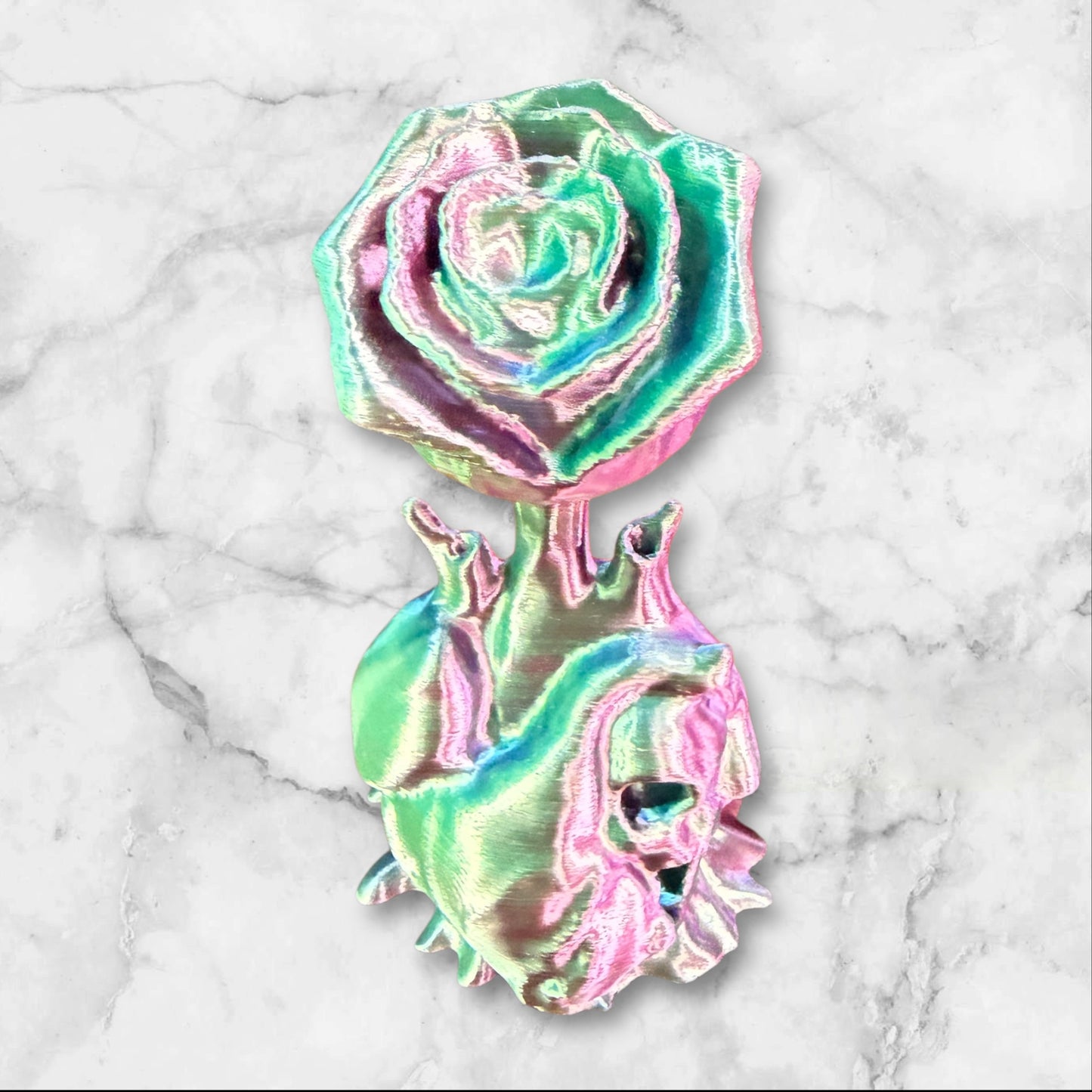 Rose coming out of a heart