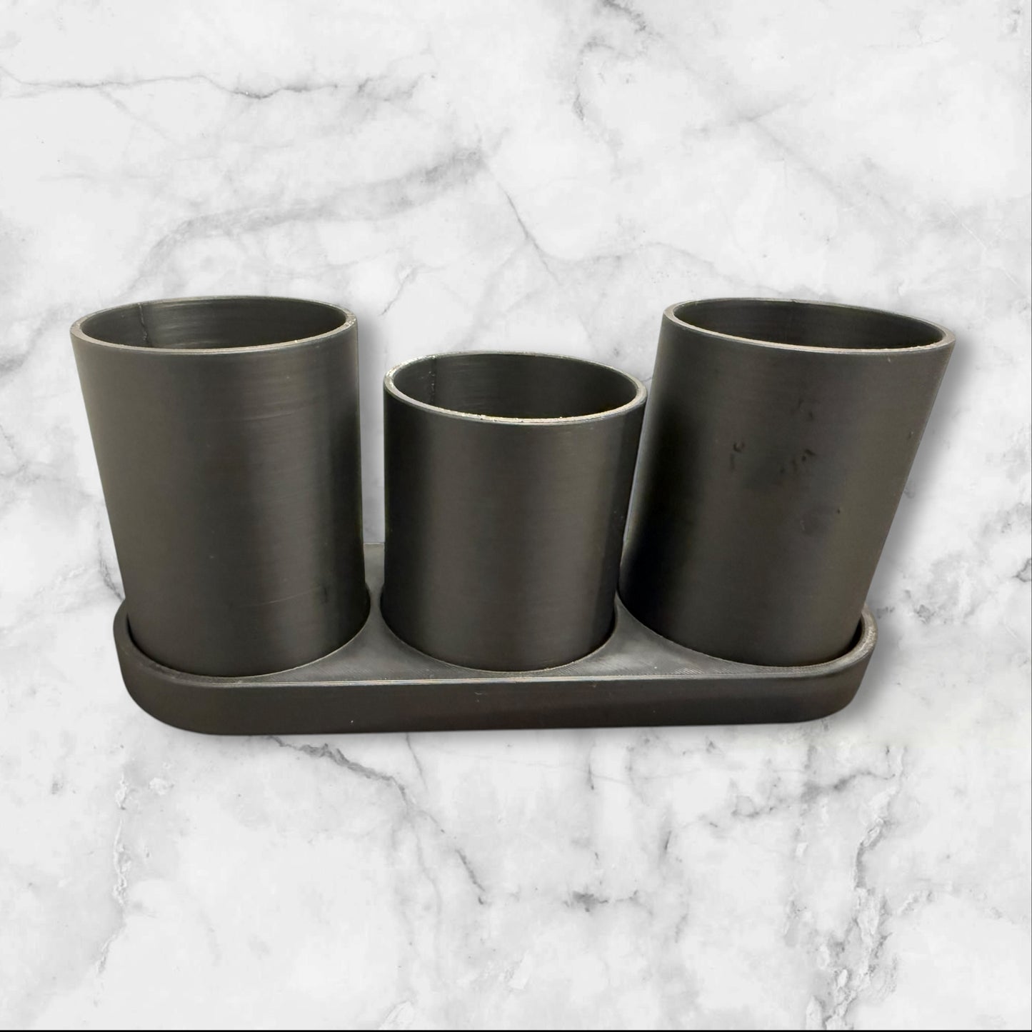 Toothbrush holder with cups