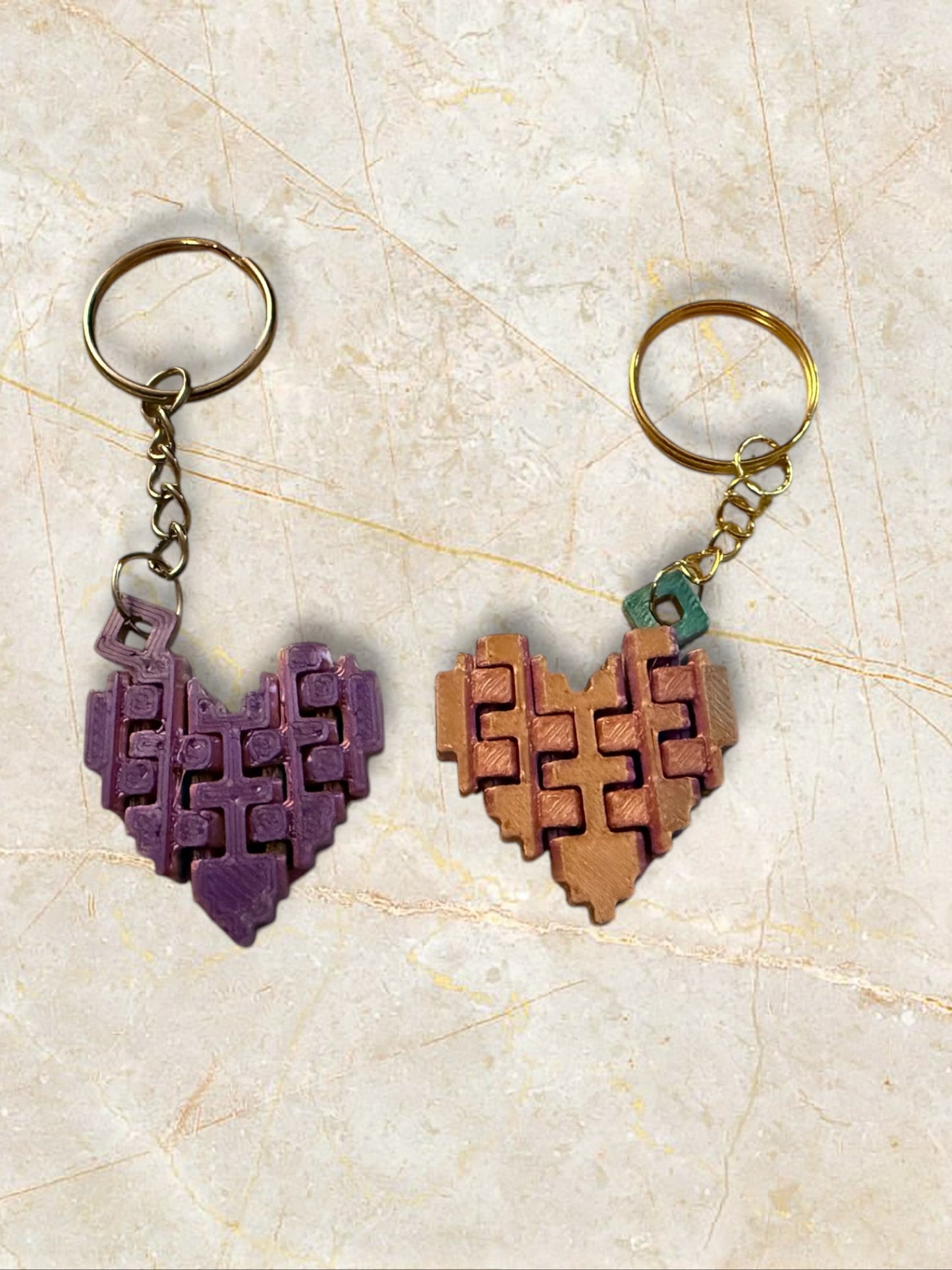 Articulating heart keychain