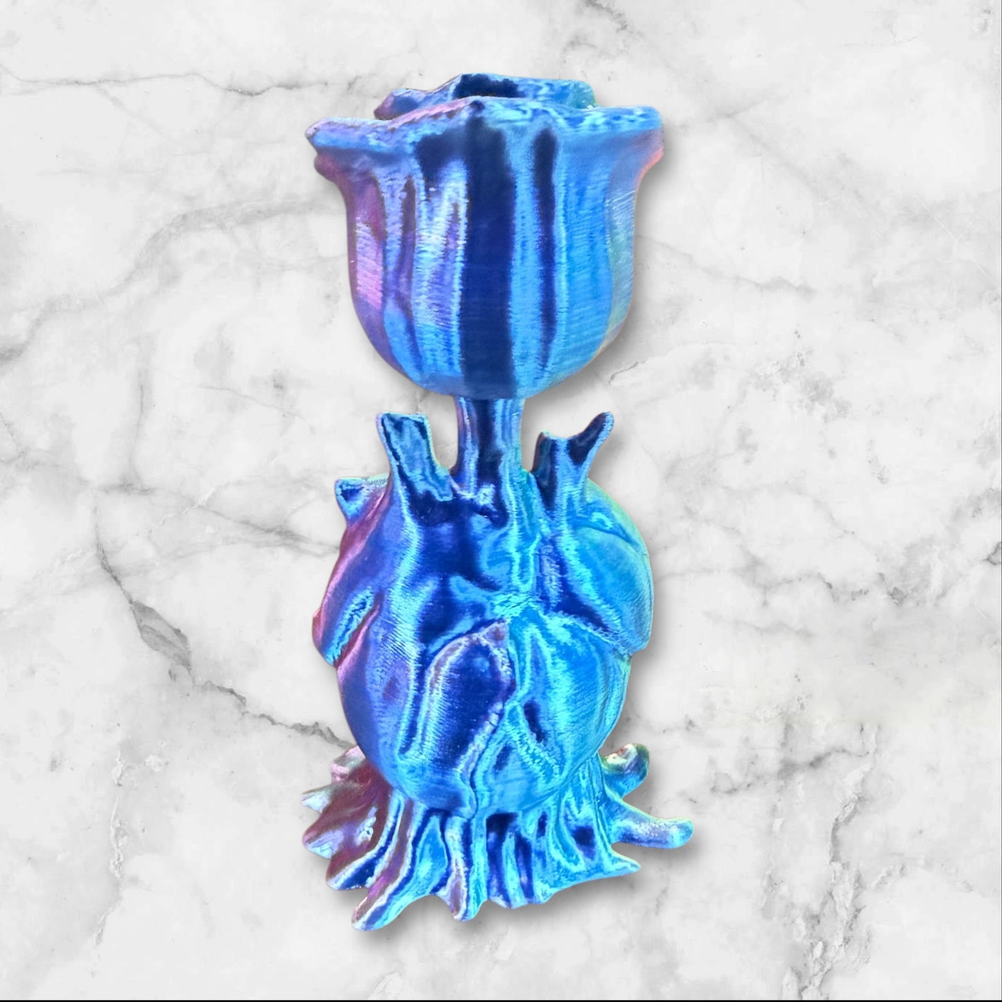 Rose coming out of a heart