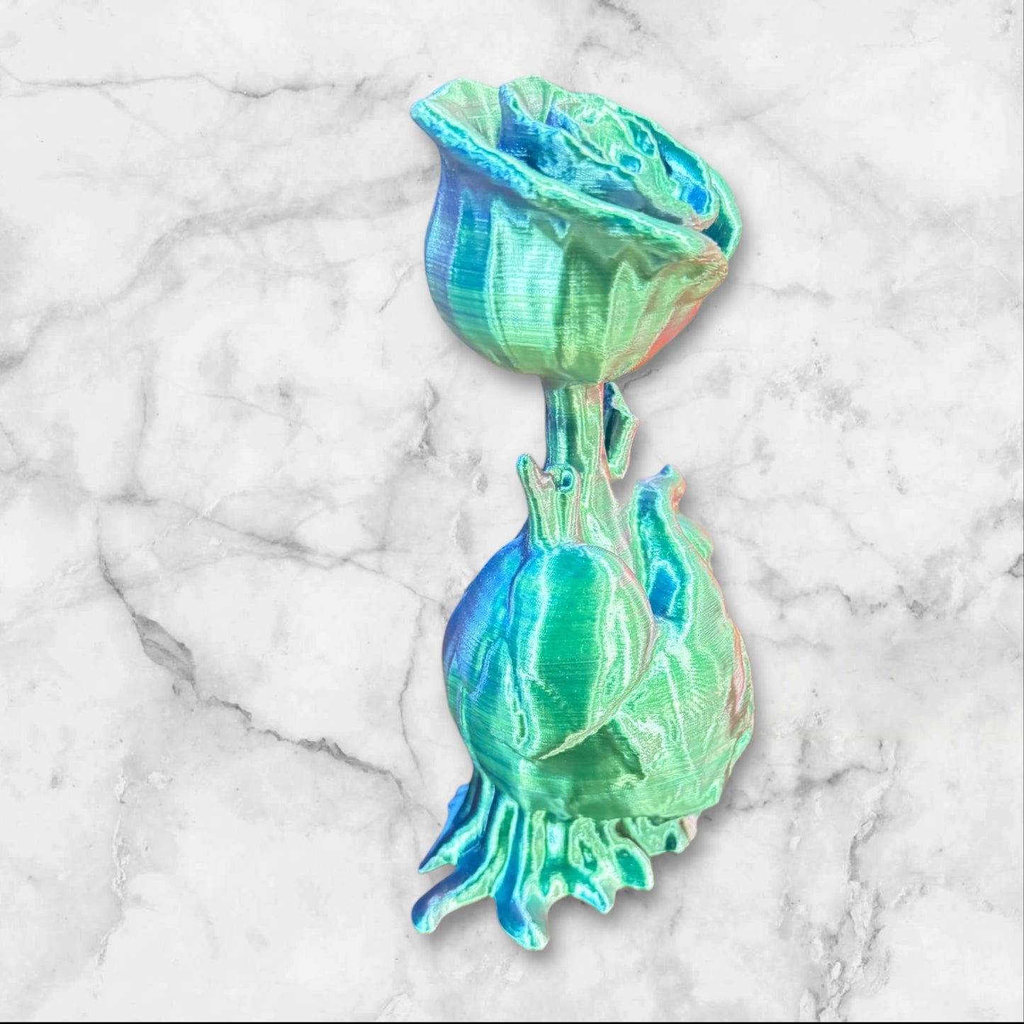 Rose coming out of a heart