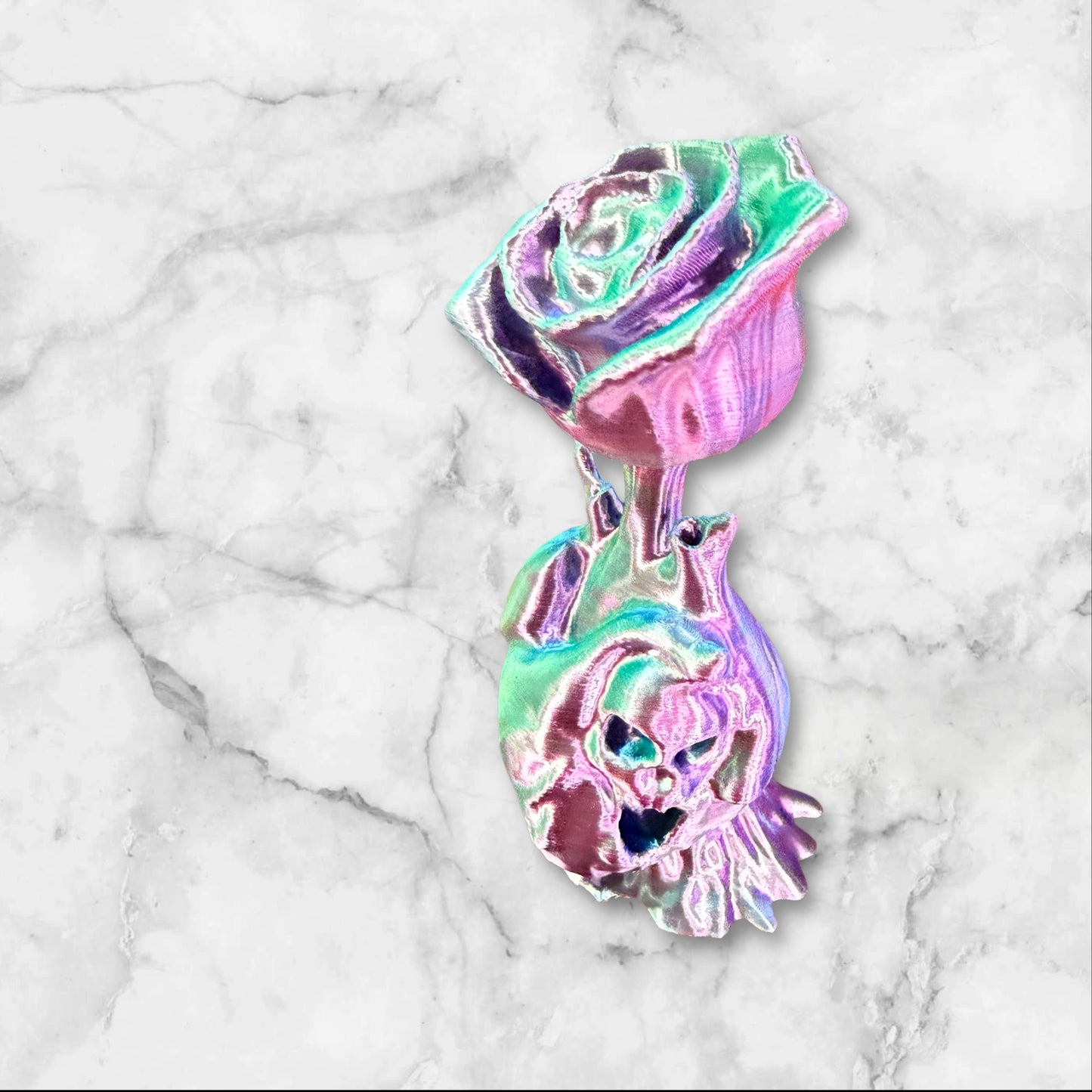 Rose coming out of a heart