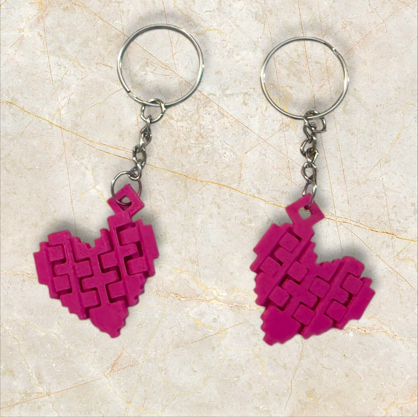 Articulating heart keychain